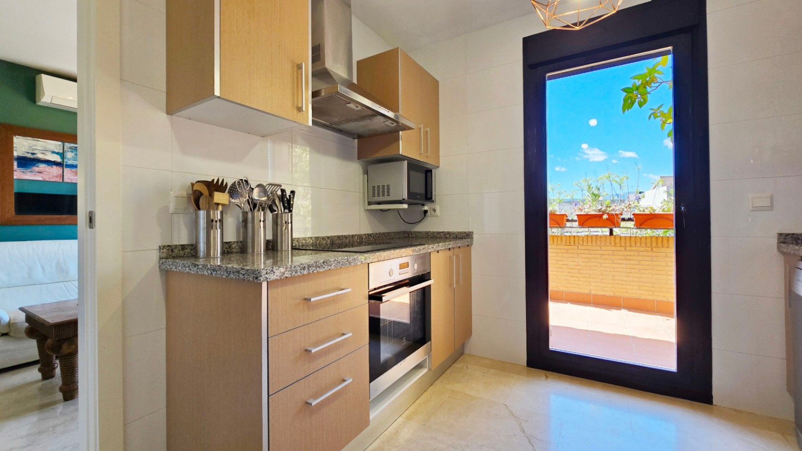 Ático en venta en Beniarbeig con terrazas privadas, vistas abiertas y garaje